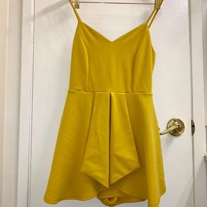 Pleated sleeveless yellow romper with straps